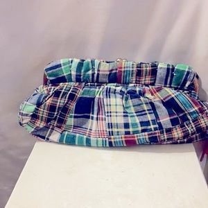 Multiple colored fabrics clutch.